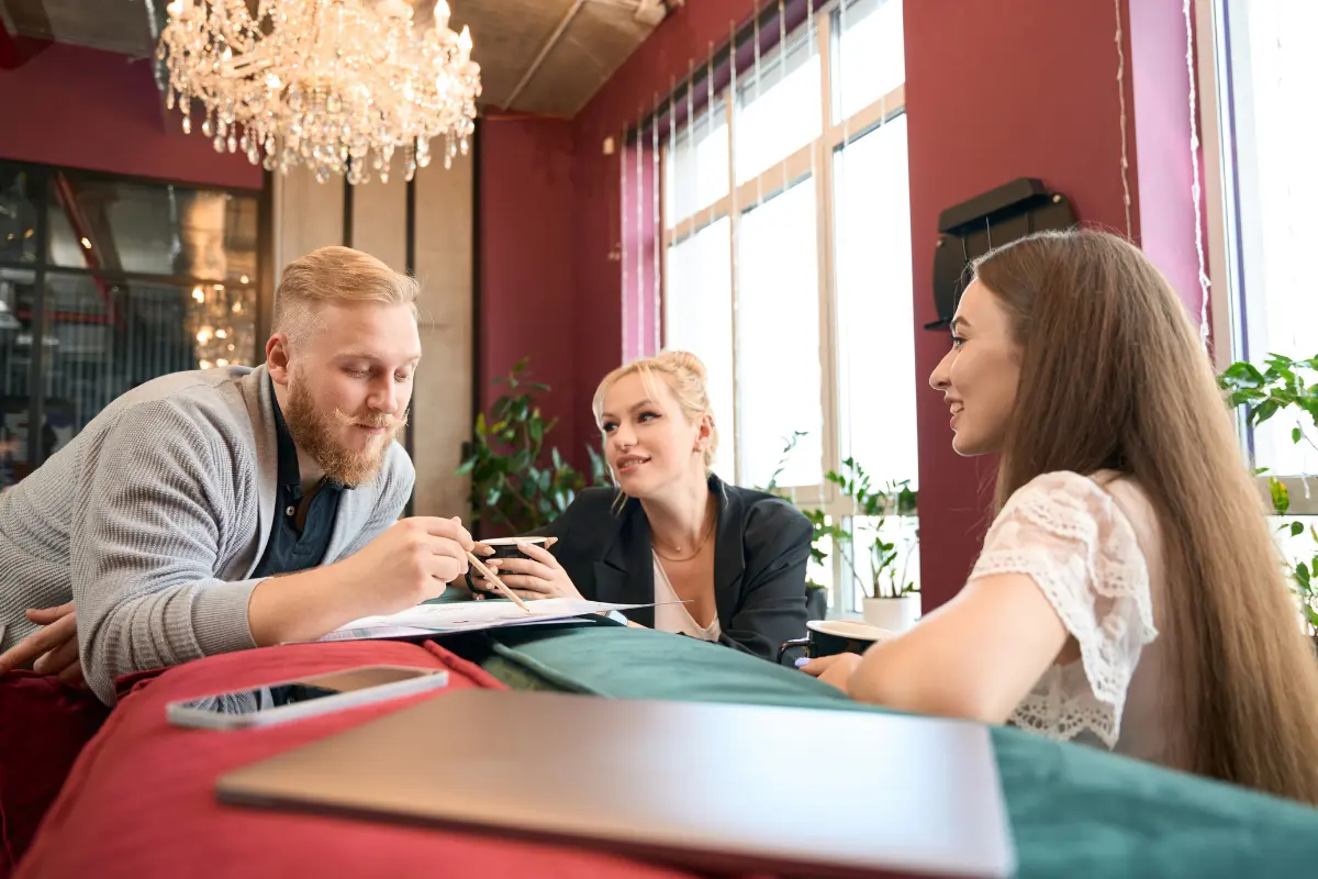 Couple Reviewing Layouts, Questions, And Logistics During A Wedding Venue Tour To Understand How The Space Supports Their Event